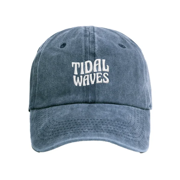 Enzyme-washed denim blue Tidal Waves dad cap with white embroidered logo on the front - Front view